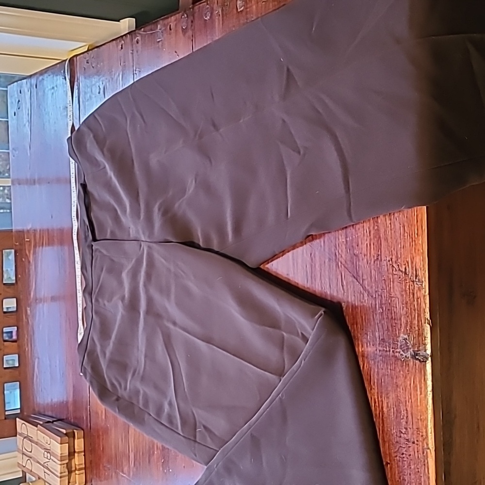 Great condition brown dress pants.  Zipper, button and hook&eye closure
